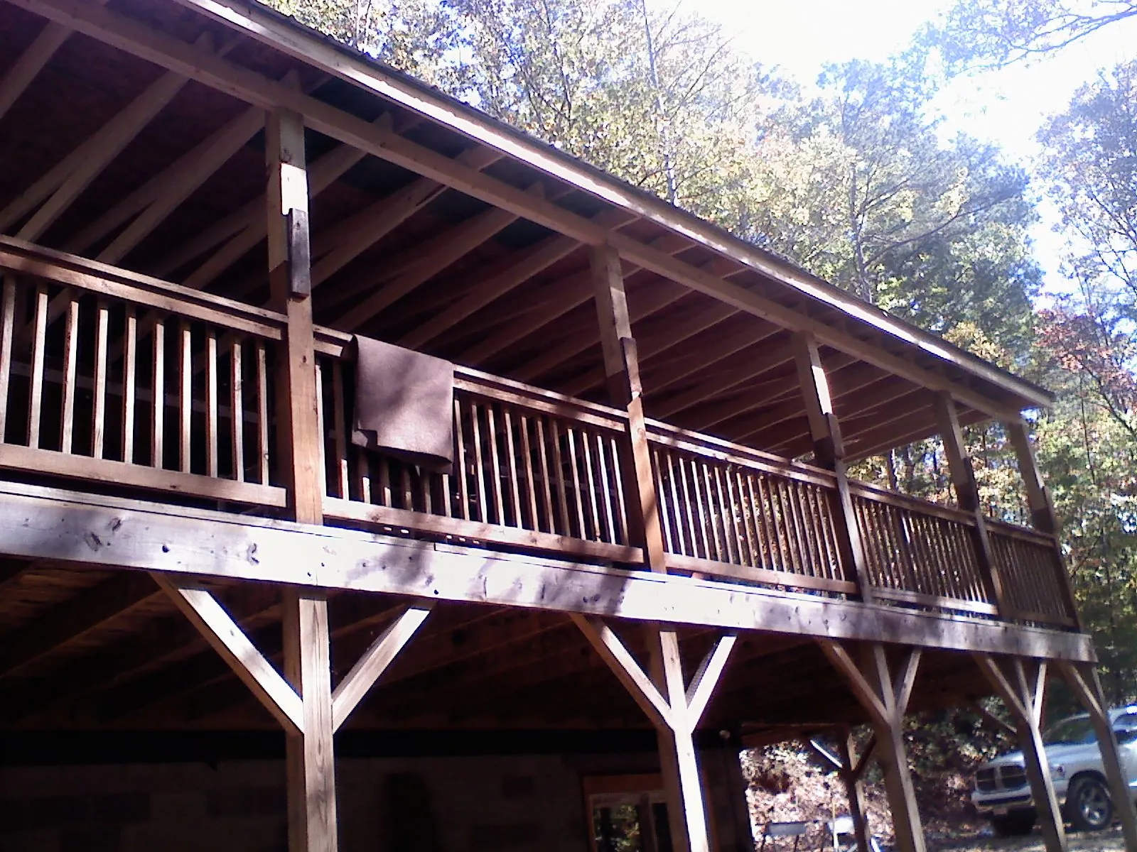 Timber framing under a new elevated porch and deck — Roof Leak Repair in Deer Lodge by Roofing Brothers